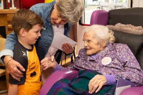 Ms Maureen Finn chatting with Neighbour Jessie Collins and her grandson Ben on the occasion of her 100th Birthday party in Riada House, Tullamore.