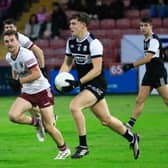 Dungiven’s Patrick O’Kane in possession of the ball.