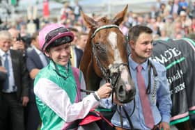Jockey Colin Keane with Item after winning the Juddmonte International