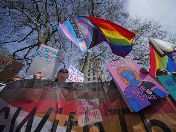 LGBT campaigners with flags