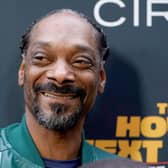 Snoop Dogg poses at the premiere of The House Next Door: Meet The Blacks 2 on June 7, 2021, in Los Angeles