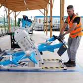 An Amazon drone is prepared for flight