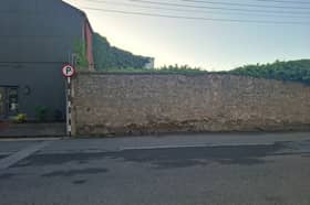The wall which surrounds the Grand Canal Harbour in Tullamore completely blocking views of the waterways amenity