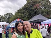 Udhyam Amin with his wife Bhavini, who have their faces together and are both smiling