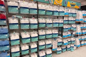 Shelves of school polos