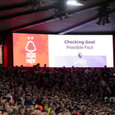 The big screen showing a VAR check for a foul by Nottingham Forest’s Igor Jesus
