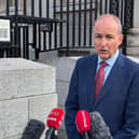 Taoiseach Micheal Martin speaks to journalists