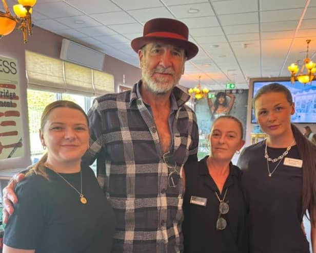 Eric Cantona with staff Dawn Mackey, Caroline Coyle and Sarah McNamara