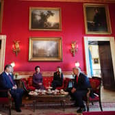US President Donald Trump, from right, and first lady Melania Trump attend a tea with China’s President Xi Jinping, from left, and his wife Peng Liyuan in the Red Room of the White House