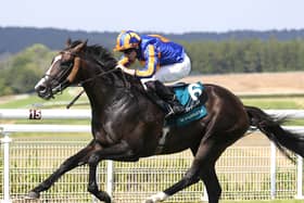 Jockey Ryan Moore and Scandinavia winning the Goodwood Cup
