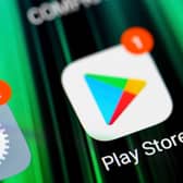 The Play Store app icon on smartphone screen