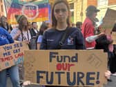 University of Limerick graduate Eva McCormack holding a sign
