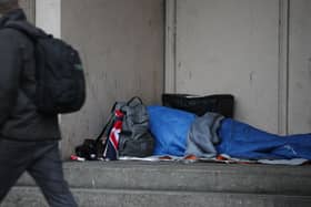 A homeless in a doorway