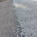 A constituent was left facing thousands of pounds in vehicle repairs due to loose stone chippings.