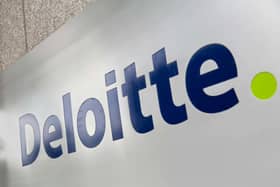 The Deloitte logo outside an office building