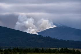 Smoke rising above the Cairngorms