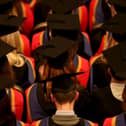 Students line up for a graduation ceremony