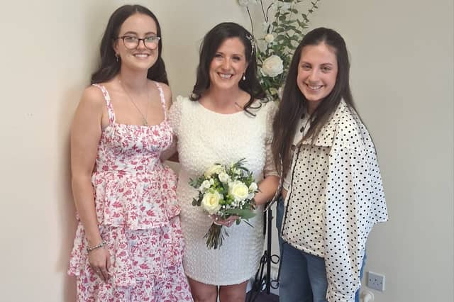 Tona Clabby pictured on her wedding day with her daughters Abbey and Grace