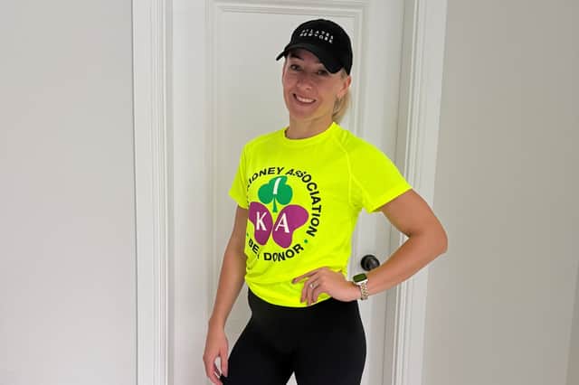 Bríd McGill in her IKA t-shirt she will wear on Dublin Marathon Day.