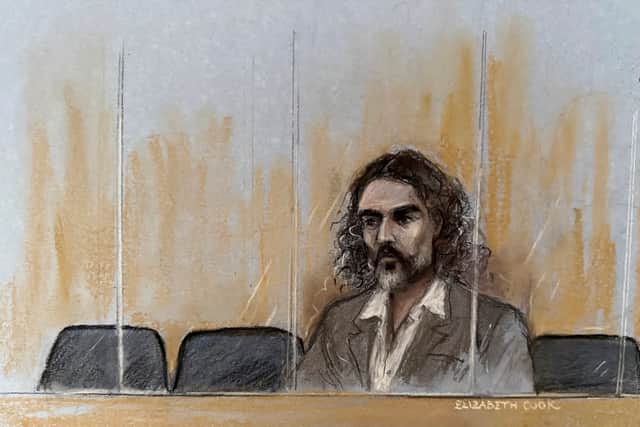 Court artist sketch by Elizabeth Cook of Russell Brand appearing in the dock during jury selection (Elizabeth Cook/PA)