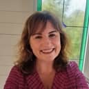 Louise Burchall's interest in laughter yoga developed due to her late father's illness. 