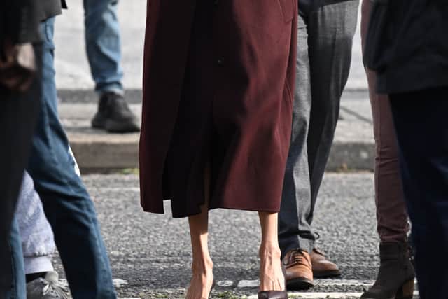 The Duchess wore a burgundy look of all-British designers (Doug Peters/PA)