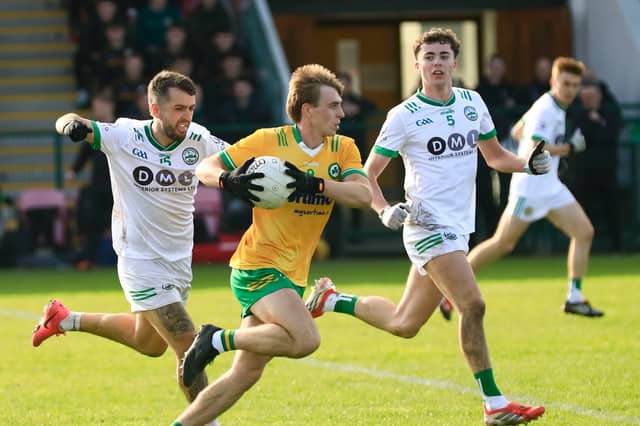 Desertmartin’s Ryan McEldowney makes a break with the ball against Craigbane in the Intermediate Football Championship semi-final at Owenbeg.
