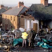 Police officers at the scene in Lockerbie