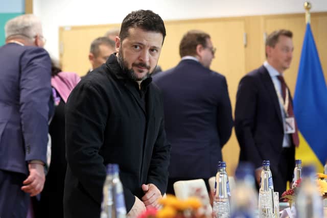 Volodymyr Zelensky at a tri-lateral meeting on the sidelines of the EU summit in Brussels (Olivier Hoslet/AP)