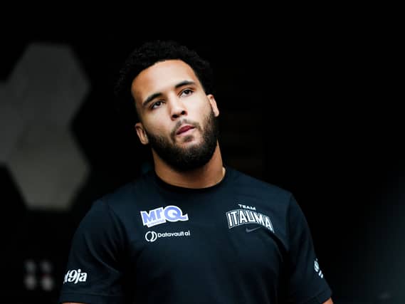 Moses Itauma looks on