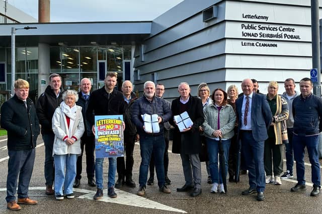 Letterkenny business owners and Letterkenny Chamber of Commerce representatives at the public service centre in Letterkenny to hand over the signed petitions