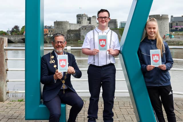 Mayor of Limerick, John Moran, Padraig O'Callaghan and Ava Crean at the launch of the An Post Cities Coats of Arms