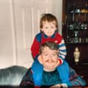 Conor Wynne on his later father Brian's shoulders