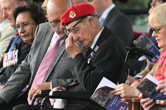 Owen Filer wipes a tear away during the national Service of Remembrance last tear (Eddie Mulholland/Daily Telegraph/PA)