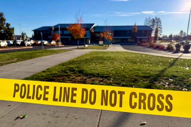 Police crime scene tape at the school (Haven Daley/AP)