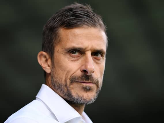 Alessio Dionisi looks on
