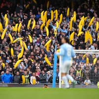 Man City fans go bananas in show of defiance following guilty verdict