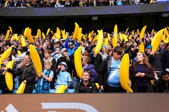 Manchester City fans with inflatable bananas in the stands ahead of the Premier League match against Ipswich (Martin Rickett/PA)
