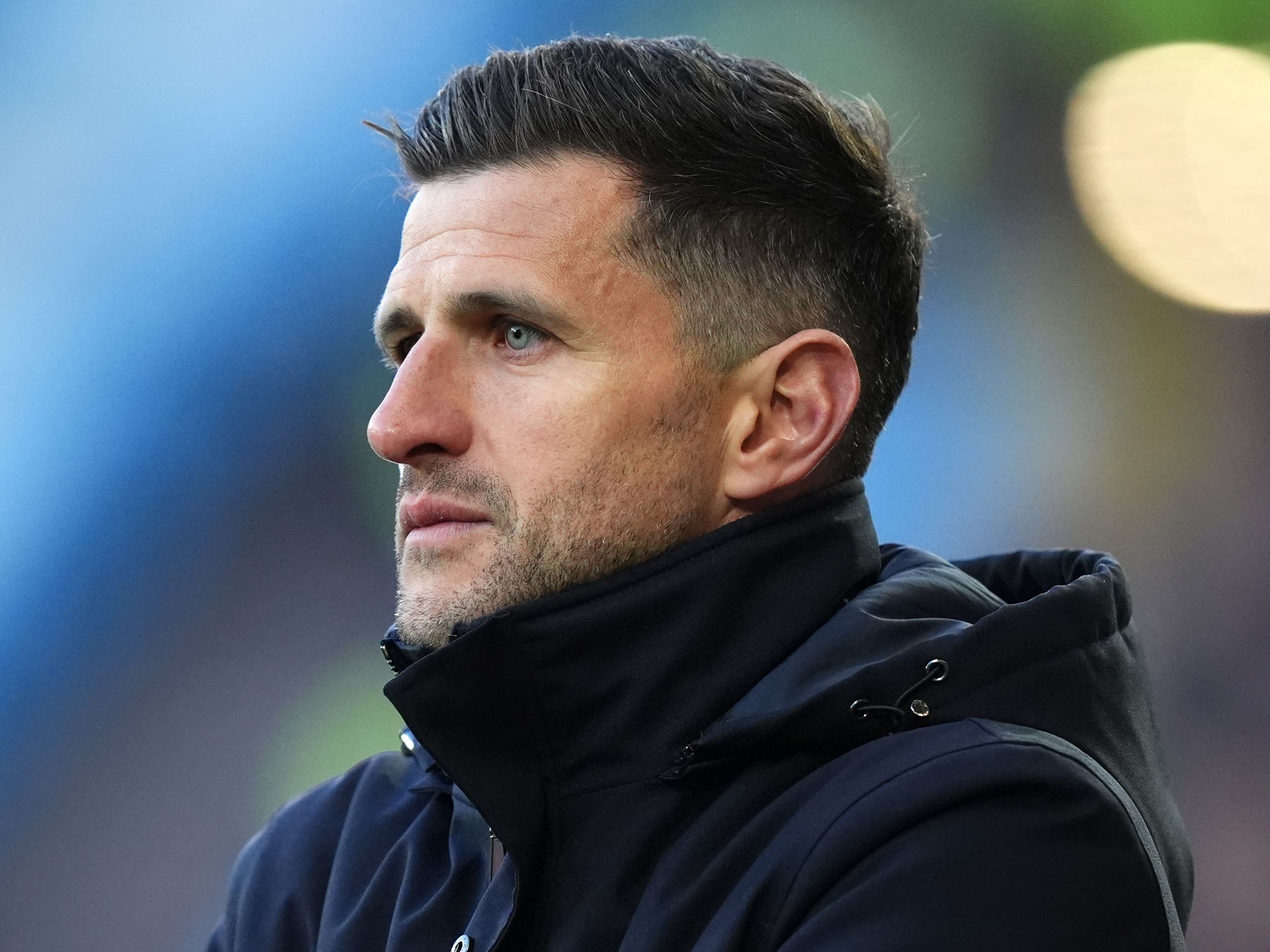 John Mousinho looks on