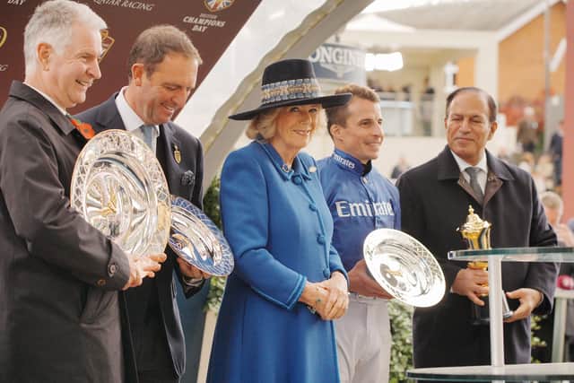 Camilla during the presentation ceremony as jockey William Buick is presented with his trophy after riding Talk of New York (Ben Birchall/PA)