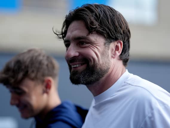 Leicester manager Russell Martin smiles