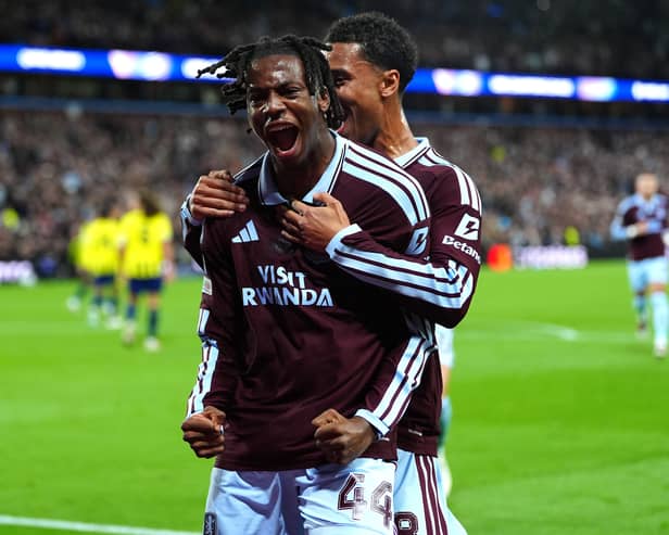 Aston Villa’s Johan Manzambi (left) celebrates scoring