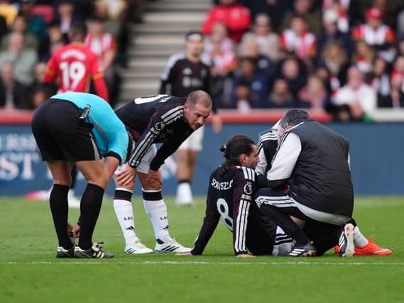Dominik Szoboszlai is treated on the pitch