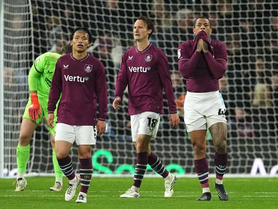 Burnley players react after conceding a second goal against Wolves