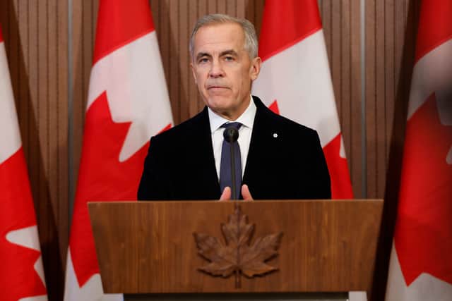 Canadian Prime Minister Mark Carney said flags would fly at half-mast on federal buildings across the country (Patrick Doyle/The Canadian Press via AP)