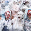 Students covered in shaving foam
