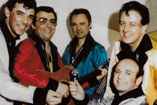 Fr Paddy O'Kane (centre) with other priests who performed in the 1980s as part of a group called The Clerics.