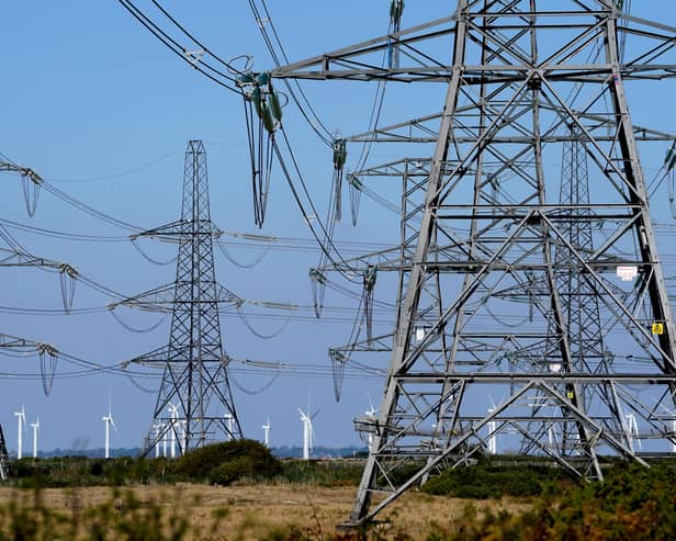 Electricity pylons run across Romney Marsh in Kent