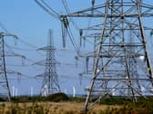Electricity pylons run across Romney Marsh in Kent