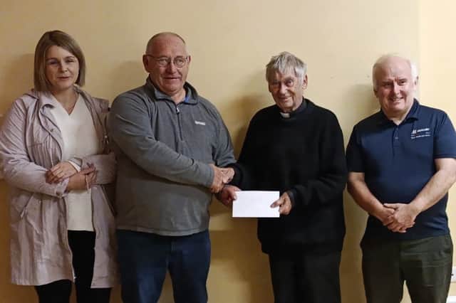 Fr Joe Flynn with Sinead Coffey, James Hackett and Neil Donovan